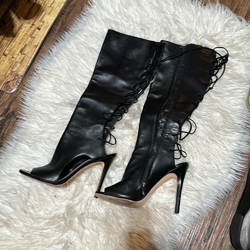 Black leather lace up back boots by Via Spiga.  Size 9.